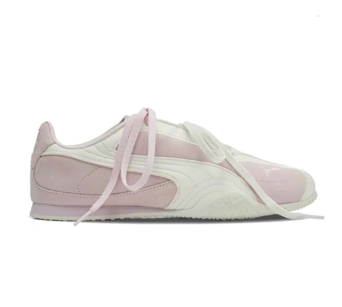 Puma Bella V2 sneakers in a light pink/off-white colorway. 
